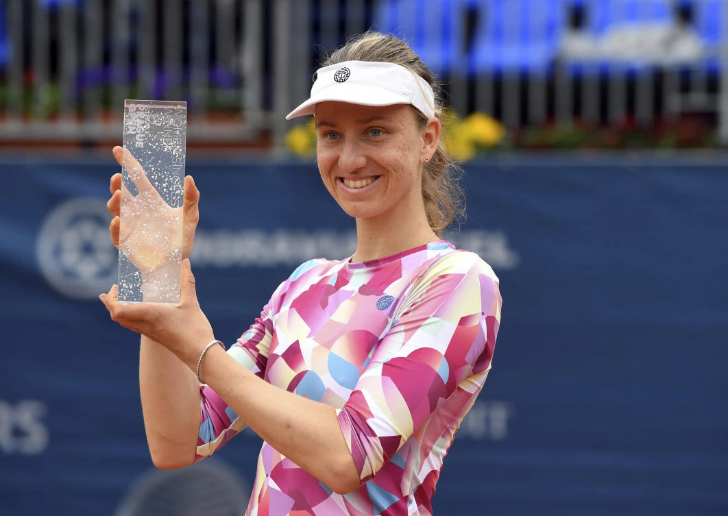 Mona Barthel of Germany poses with a trophy after winning the Prague Open Tennis Tournament final match against Kristyna Pliskova of Czechia in Prague Saturday. (AP)