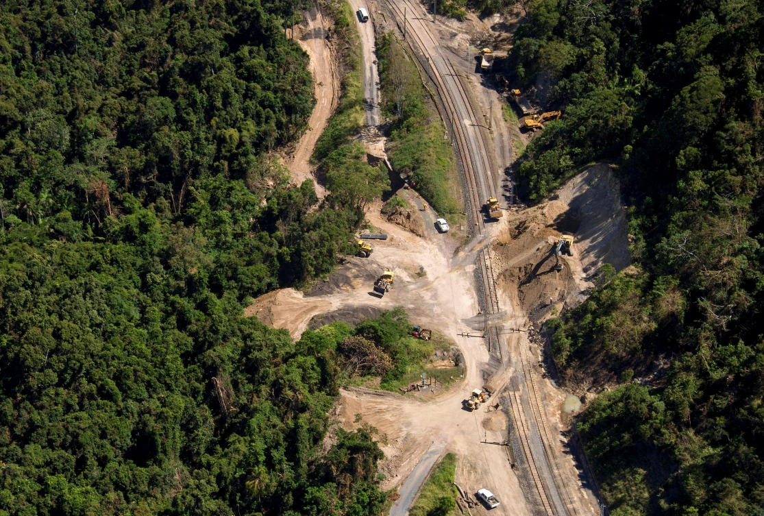 Workmen repair a section of the Goonyella rail system, that services coal mines in the Bowen Bason, after a landslide damaged the tracks as a result of heavy rain associated with Cyclone Debbie, at a section called Black Mountain located near the Queensland town of Mackay in Australia, April 11, 2017. Picture taken April 11, 2017. REUTERS/Daryl Wright FOR EDITORIAL USE ONLY. NO RESALES. NO ARCHIVE