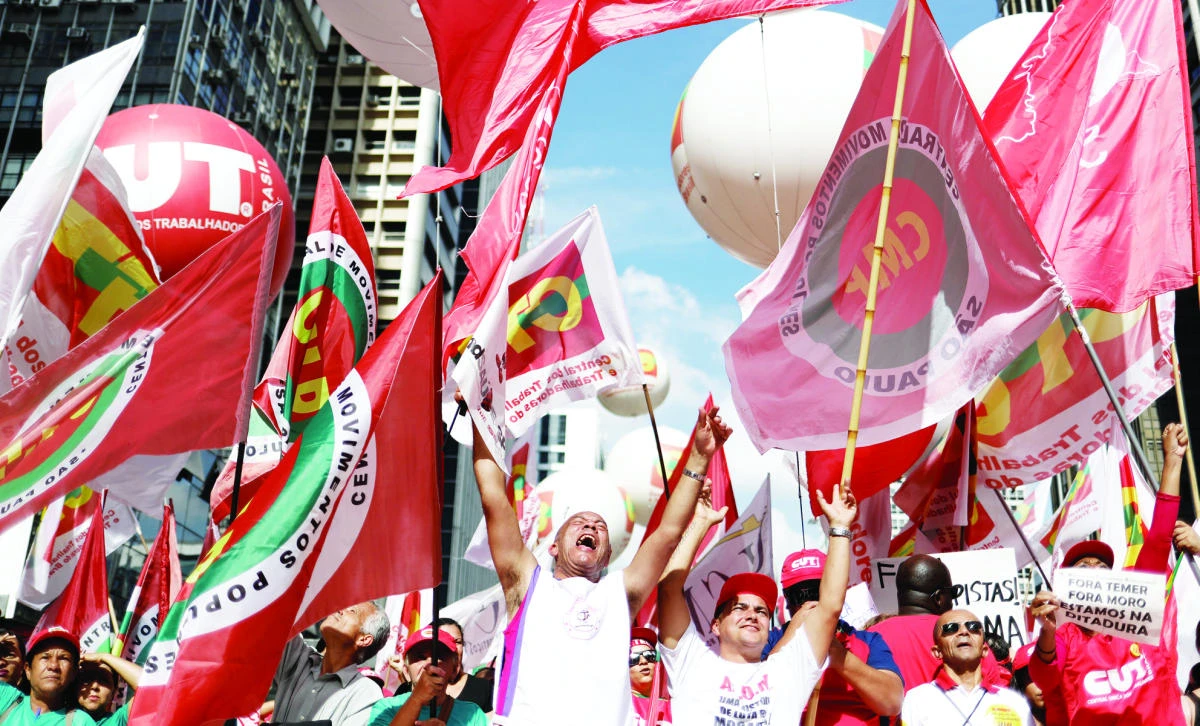 Trade unionists take part in a demonstration against Brazil’s President Michel Temer in Sao Paulo recently. (Reuters)
