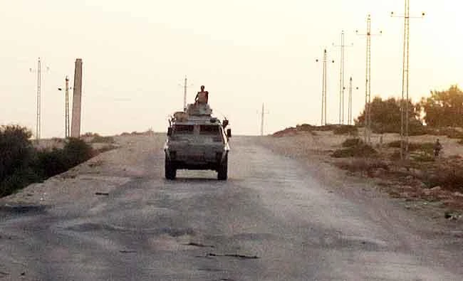 An Egyptian military vehicle is seen on the highway in northern Sinai, Egypt, in this May 25, 2015 file photo. (Reuters)