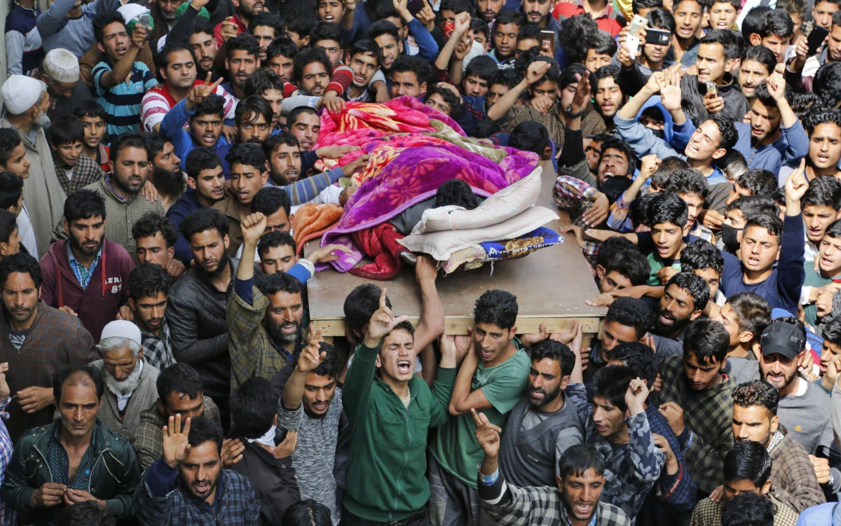 Kashmiri villagers shout pro freedom slogans as they carry the body of rebel Fayaz Ahamed during his funeral in Kaimuh, 67 kilometers (49 miles) south of Srinagar, Indian controlled Kashmir, Sunday, May 7, 2017. Ahamed, one among the assailants was killed in a gun battle Saturday night after rebels attacked a police squad in the Indian portion of Kashmir. Three civilians and one officer were also killed in the gun battle. (AP)