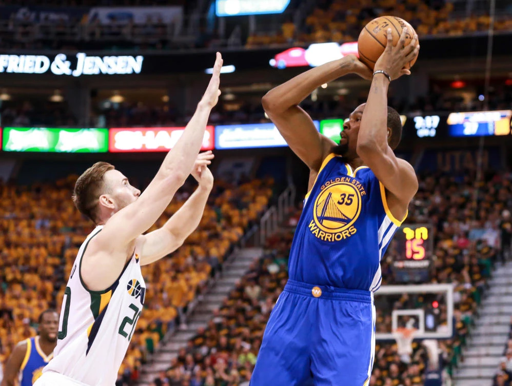 Golden State Warriors forward Kevin Durant shoots the ball over Utah Jazz forward Gordon Hayward during the second quarter in Game 3 of the second round of the 2017 NBA Playoffs at Vivint Smart Home Arena on Saturday. (USA TODAY Sports)