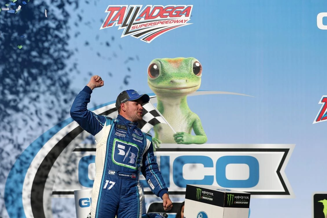 Ricky Stenhouse Jr., driver of the #17 Fifth Third Bank Ford, celebrates in Victory Lane after winning the Monster Energy NASCAR Cup Series GEICO 500 at Talladega Superspeedway on Sunday in Talladega, Alabama. (AFP)