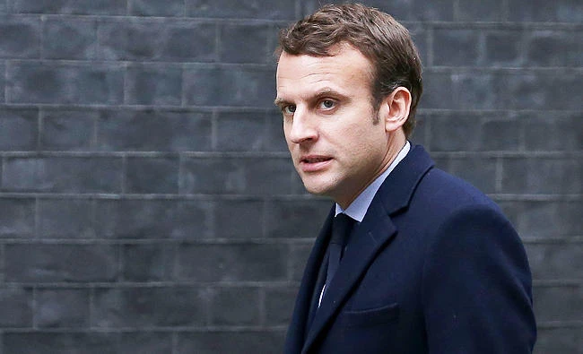 This file photo taken on February 21, 2017 shows French presidential election candidate for the En Marche ! movement Emmanuel Macron, arriving outside 10 Downing Street in central London, ahead of his meeting with British Prime Minister Theresa May. (AFP)