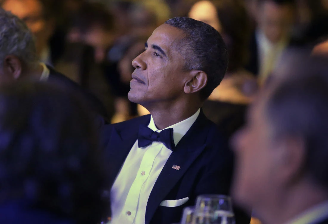 Former President Barack Obama listens to musician James Tayor during ceremonies for the 2017 Profile in Courage award at the John F. Kennedy Presidential Library and Museum on Sunday, May 7, 2017, in Boston. Obama was presented with the 2017 award Sunday. (AP)