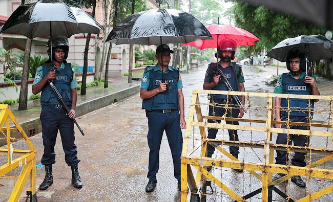 Bangladeshi policemen stand guard in Dhaka, Bangladesh, in this file photo. (AP)