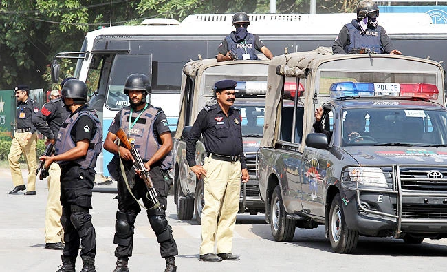 Pakistani police commandos stand guard in Lahore, Pakistan, in this file photo. (AP)