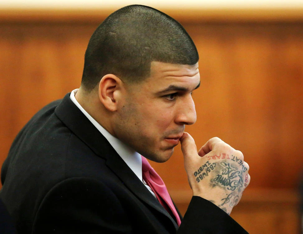 Former New England Patriots football player Aaron Hernandez sits during his murder trial at Bristol County Superior Court in Fall River, Massachusetts, US on April 2, 2015. (REUTERS/Steven Senne/Pool/File Photo)