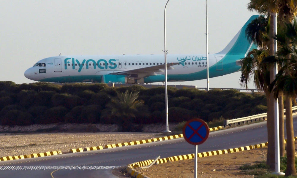 A plane from the low-cost Saudi carrier flynas taxies on the tarmac at the King Khalid International Airport in Riyadh in this January 12, 2017 file photo. (AFP / FAYEZ NURELDINE)