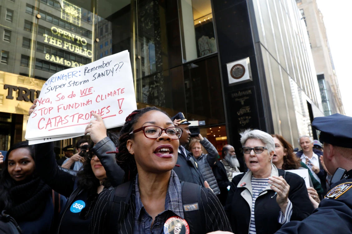 Protesters gather for a fossil fuel and climate change protest at Trump Tower in Manhattan, New York City, New York. (Reuters)