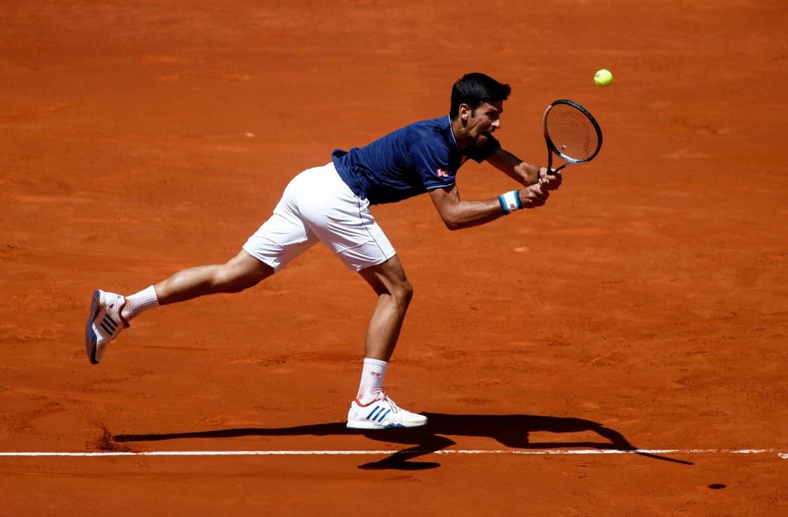 Serbian tennis player Novak Djokovic returns the ball to Spanish tennis player Nicolas Almagro during the ATP Madrid Open in Madrid on Wednesday. (AFP)