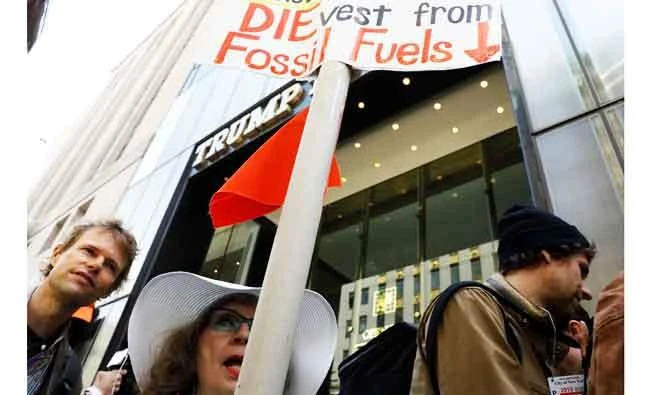 Protesters gather for a fossil fuel and climate change protest at Trump Tower in Manhattan, New York City, New York, U.S., in this May 9, 2017 photo. (REUTERS)