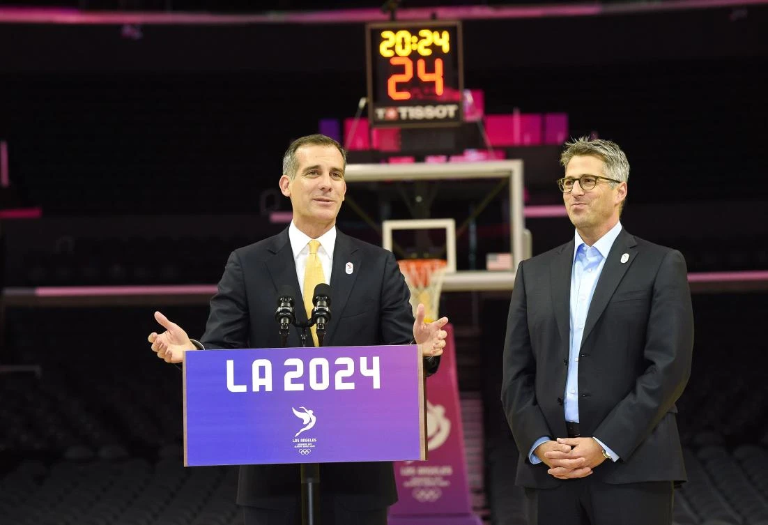 Los Angeles Mayor Eric Garcetti and LA 2024 Chairman Casey Wasserman hold a news conference on the Los Angeles Lakers' hard court floor inside Staples Center, one of the proposed venues, after a full day of meeting with the IOC Evaluation Commission who are touring the Los Angeles 2024 Summer Olympic venues Wednesday in Los Angeles. (AFP)