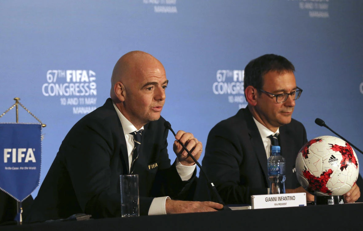 FIFA President Gianni Infantino, left, speaks during the FIFA Congress, in Manama Thursday. (AP)