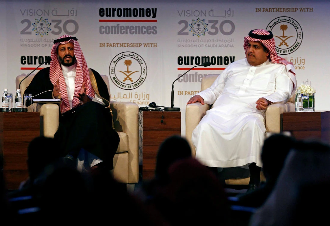 Khalid Al-Hussan, chief executive officer of the Saudi Stock Exchange (Tadawul), with Mohammed El-Kuwaiz, vice chairman of the Capital Market Authority, at an economic conference in Riyadh recently. (Reuters)