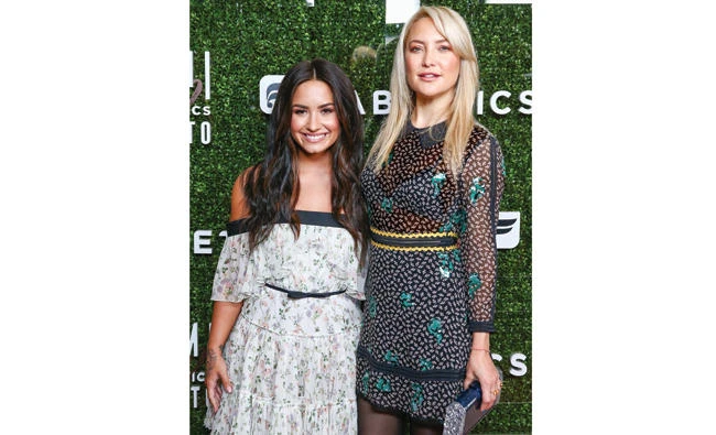 Singer Demi Lovato and actor Kate Hudson attend the launch of Fabletics Capsule Collection in Los Angeles. (AFP)