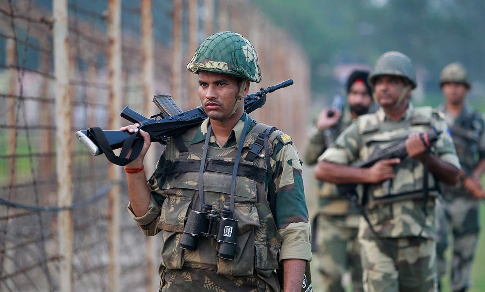 Indian Border Security Force soldiers patrol the India-Pakistan border. (AP)