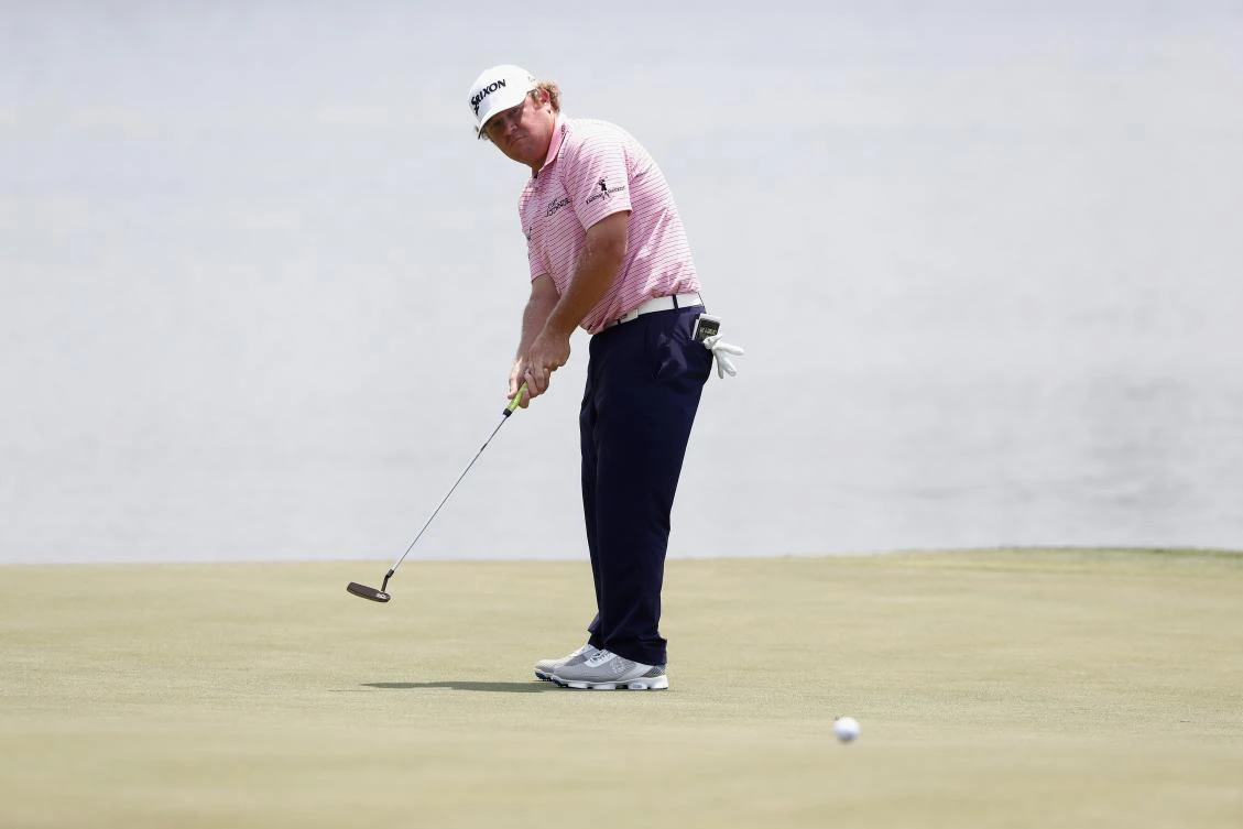 William McGirt putts on the 18th green during the first round of the Players Championship at the Stadium course at TPC Sawgrass in Ponte Vedra Beach, Florida, on Thursday. (AFP)