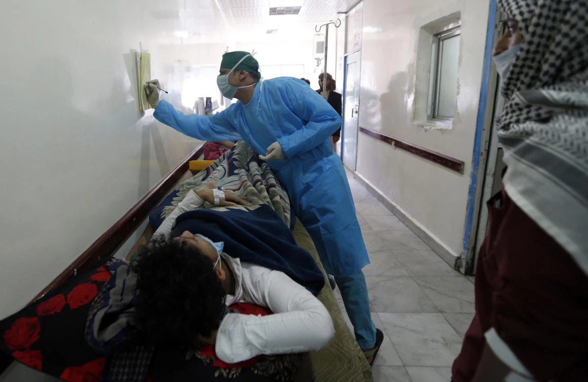 A Yemeni man suspected of being infected with cholera receives treatment at a hospital in Sanaa. (AFP)
