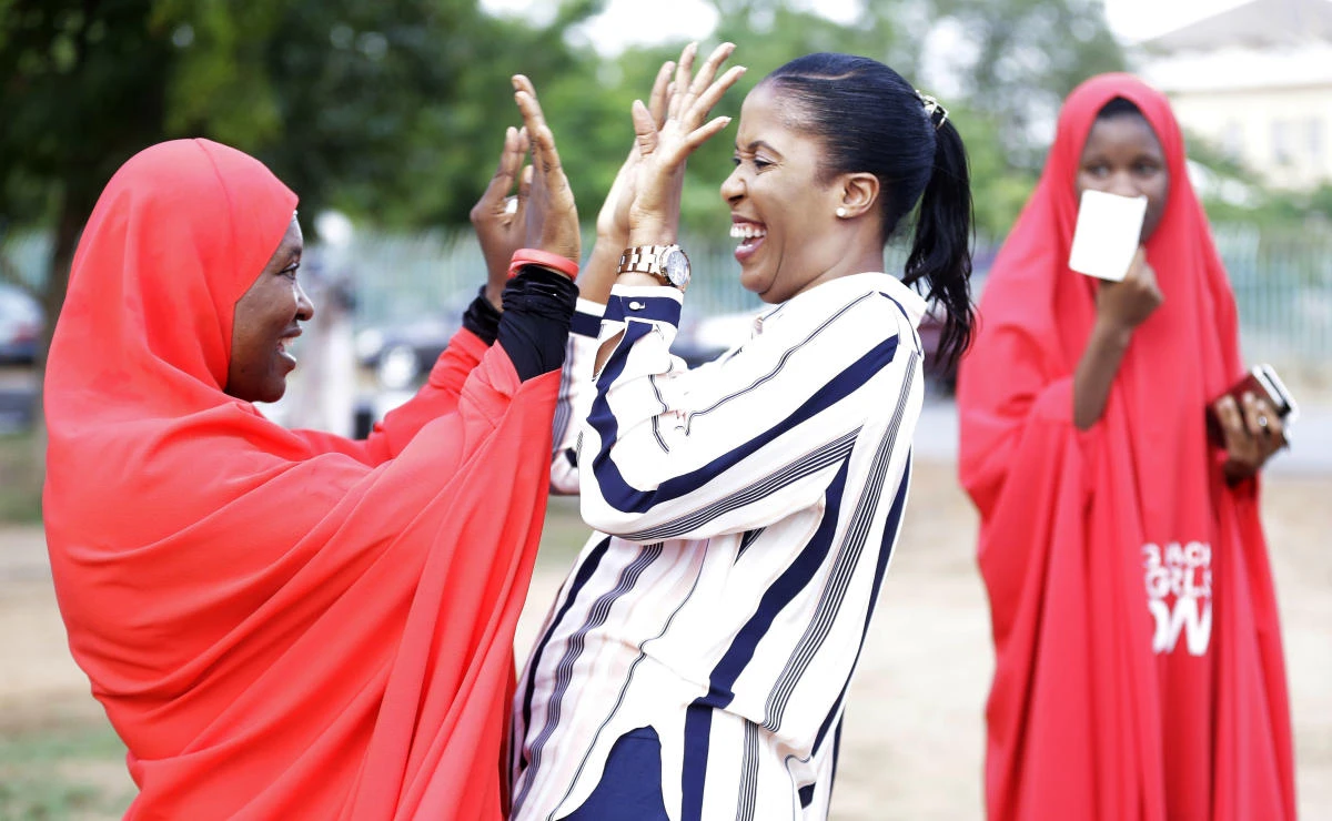 'Bring Back Our Girls' campaigners celebrate the release of the kidnapped Chibok school girls at the unity fountain in Abuja, Nigeria. (AP)