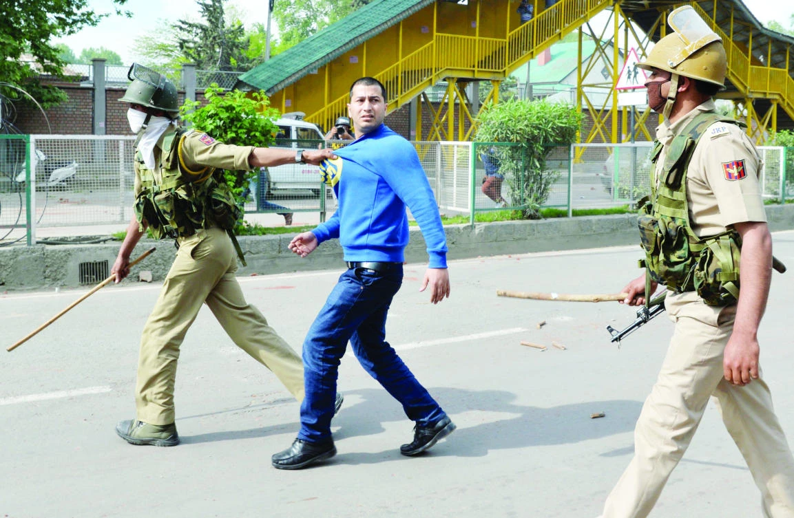 Indian police arrest a Kashmiri student during clashes in central Srinagar recently. (AFP)