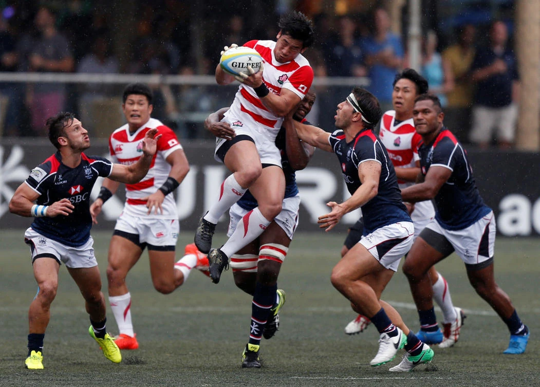 Japan's Ryoto Nakamura leaps for the ball during final match agaisnt Hong Kong Saturday in the Asian Rugby Championship. (Reuters)