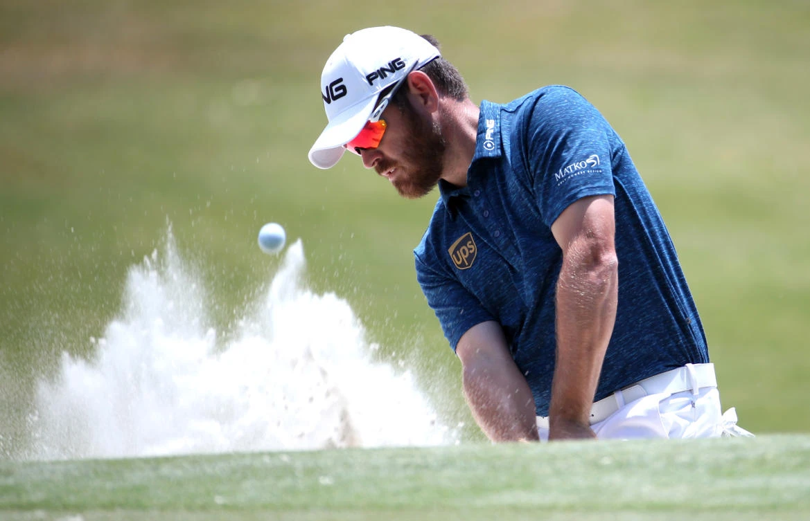 Louis Oosthuizen hits from a bunker on the 15th hole during the second round of The Players Championship golf tournament at TPC Sawgrass on Friday. (USA TODAY Sports)