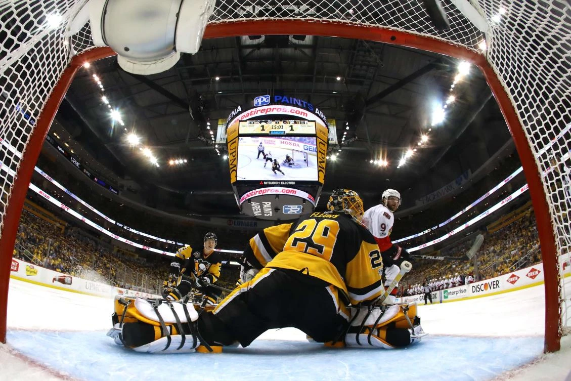 Bobby Ryan (9) of the Ottawa Senators scores a goal against goaltender Marc-Andre Fleury of the Pittsburgh Penguins in overtime of Game 1 of the Eastern Conference Final during the 2017 NHL Stanley Cup Playoffs at PPG PAINTS Arena on Saturday in Pittsburgh, Pennsylvania. The Ottawa Senators defeated the Pittsburgh Penguins 2-1 in overtime. (AFP)