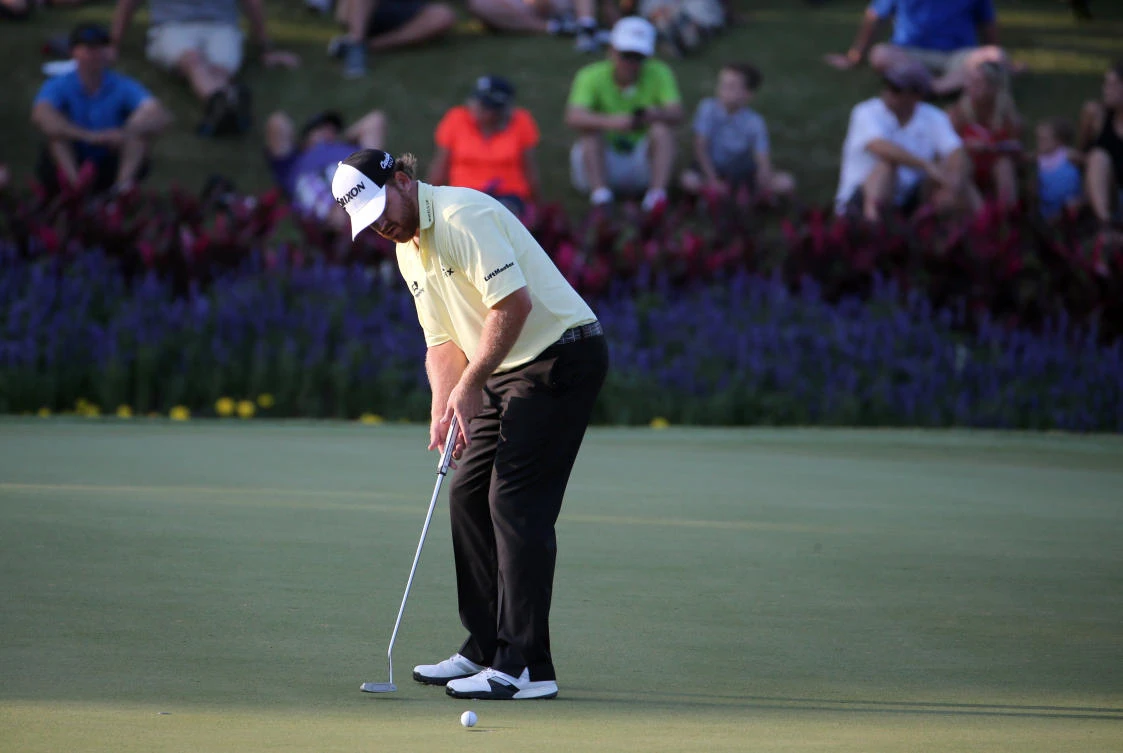 J.B. Holmes putts for a birdie on the 17th hole during the third round of The Players Championship golf tournament at TPC Sawgrass' Stadium Course on Saturday. (USA TODAY)