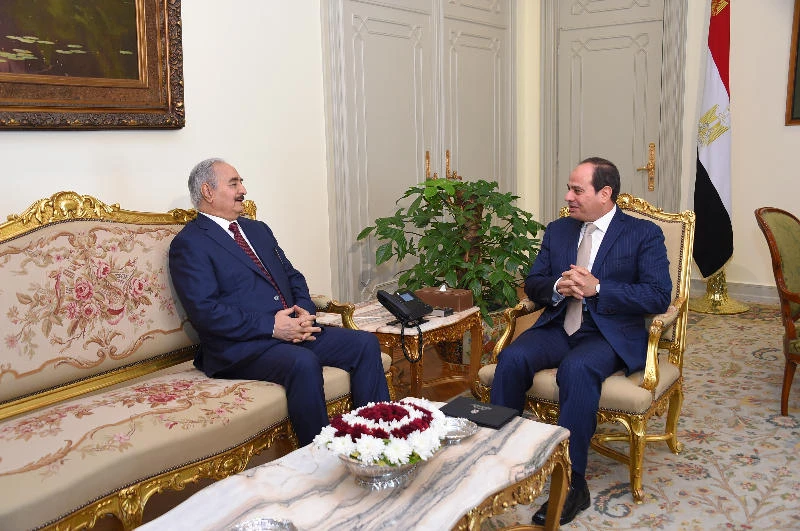Egyptian President Abdel Fattah El-Sisi, right, meeting with Libyan military strongman Khalifa Haftar in Cairo on Saturday. (AFP)