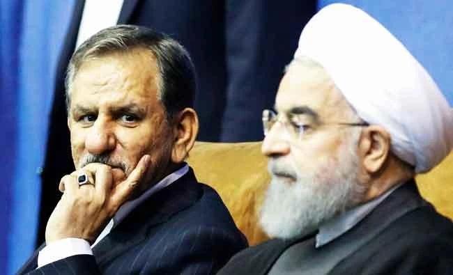 Iranian President and presidential candidate Hassan Rouhani (R), along with current vice-president and presidential candidate Eshaq Jahangiri, attend a campaign rally for the upcoming presidential elections in the capital Tehran on Saturday. (AFP)