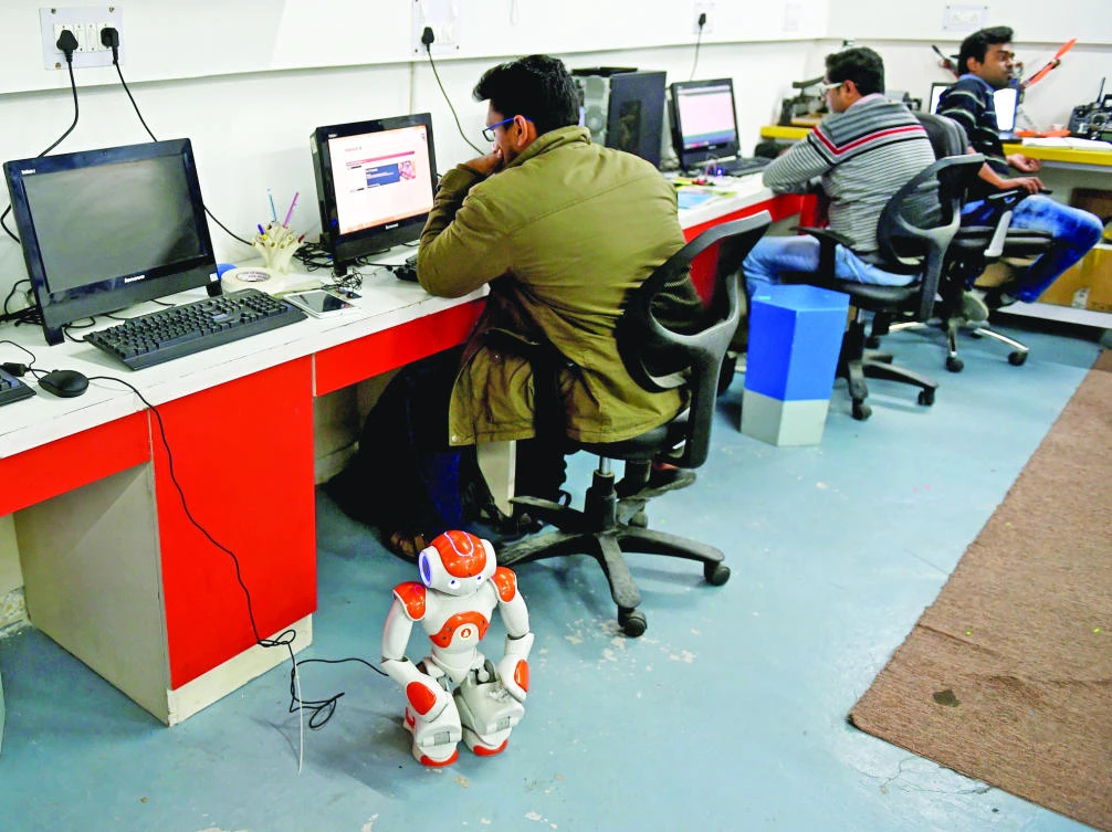 While India’s big business houses are among Modi’s loudest cheerleaders, economist Sunil Sinha said making things at home remains a fraught process for smaller firms. (AFP)