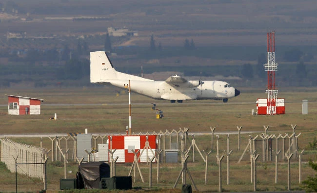 In this July 29, 2015 file photo a German Air Force cargo plane maneuvers on the runway after it landed at the Incirlik Air Base, in the outskirts of the city of Adana, southern Turkey. Turkey has blocked a request for German lawmakers to visit their country's soldiers at the Incirlik air base, increasing the possibility that it might relocate planes supporting the campaign against the Daesh group. (AP Photo/Emrah Gurel,file)