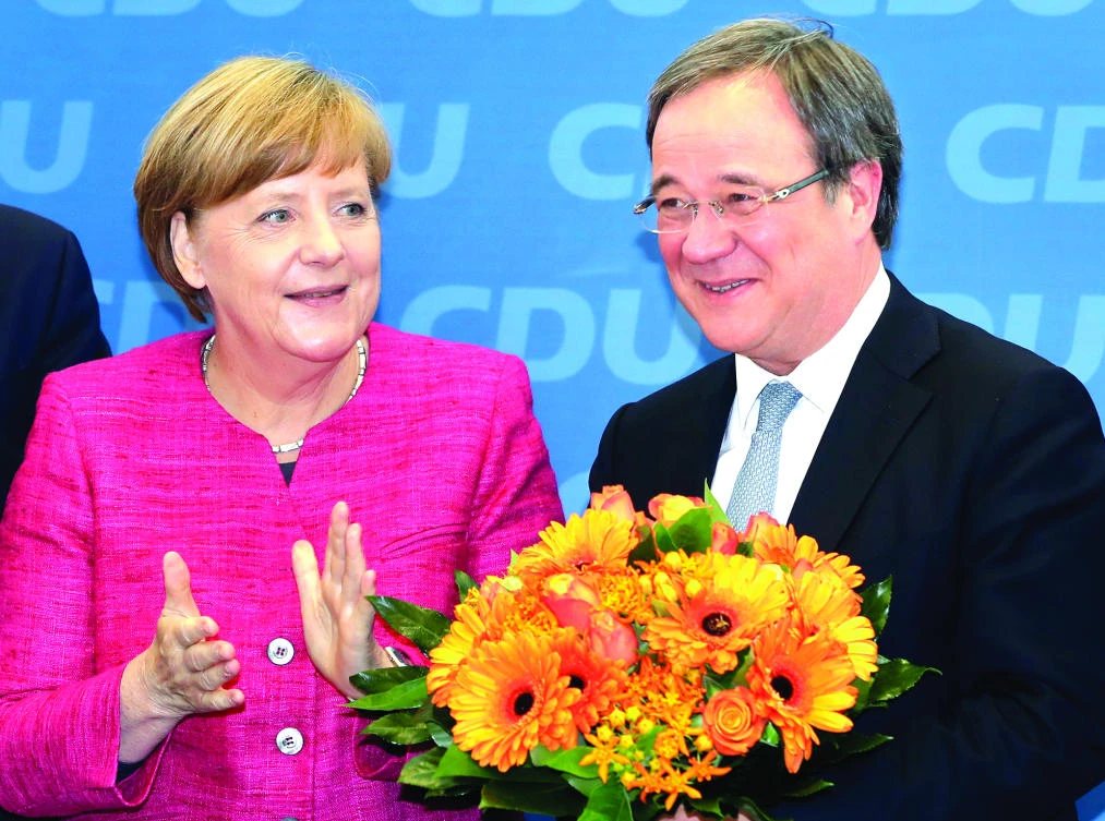 Victory in state vote shows Merkel on course to retain power