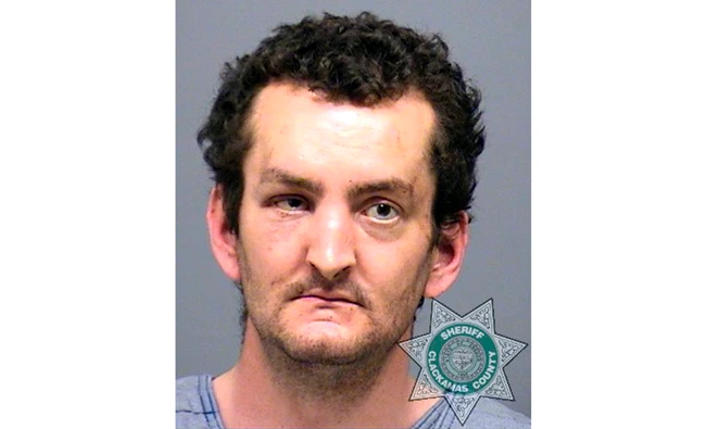 This undated photo provided by the Clackamas County Sheriff's office shows Joshua Webb, who is accused of beheading his mother and stabbing a grocery employee in Estacada, Oregon,US, on May 15, 2017. (Clackamas County Sheriff's Office via AP)
