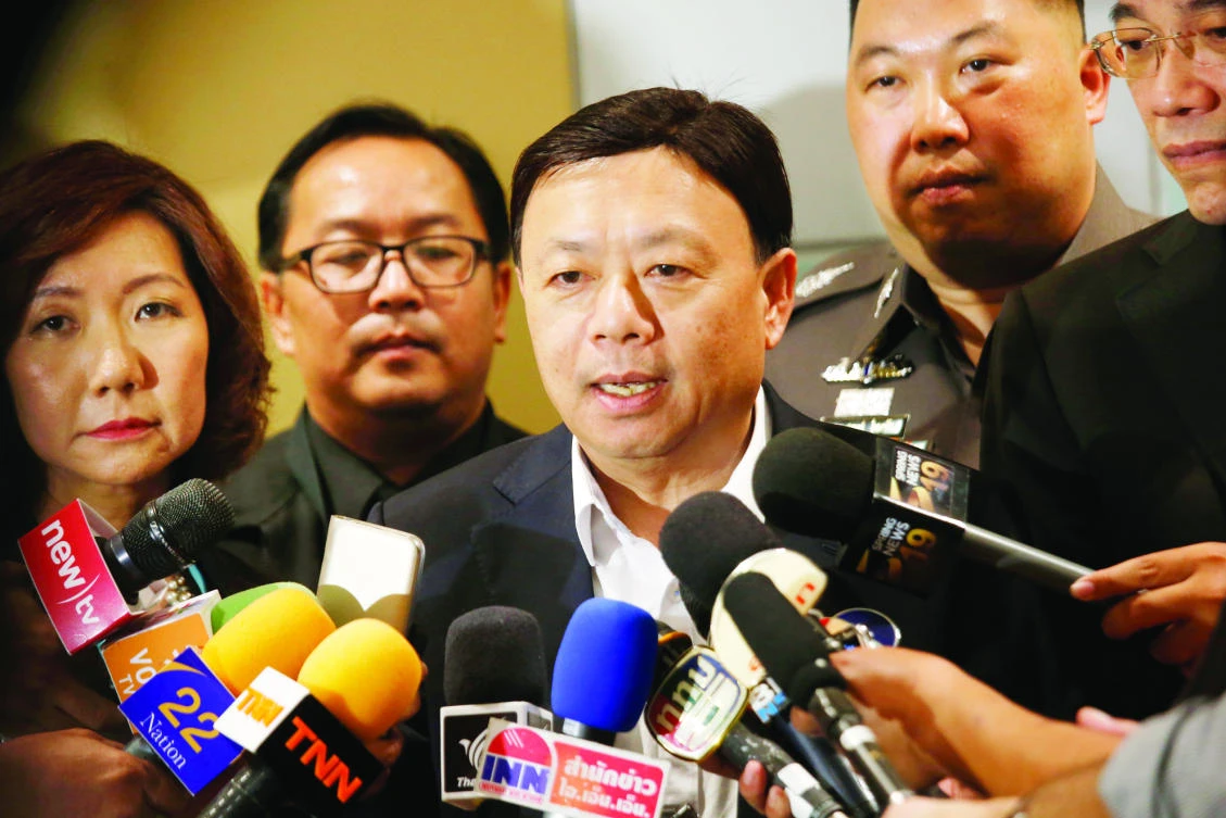 Takorn Tantasith, secretary-general of Thailand’s National Broadcasting and Telecommunication Commission, talks to reporters in Bangkok on Tuesday. (AP)