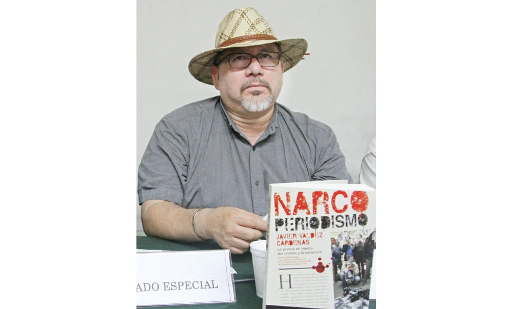Journalist Javier Valdez speaks during the presentation of his book in Acapulco, Mexico, on March 22. (AP)