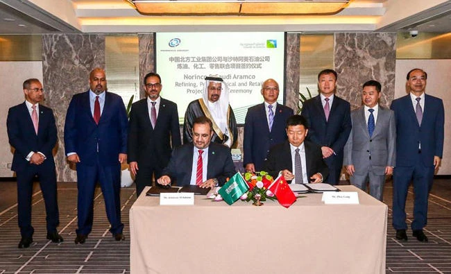 Saudi Energy Minister Khalid Al-Falih fourth from left, at the signing ceremony. (SPA photo)