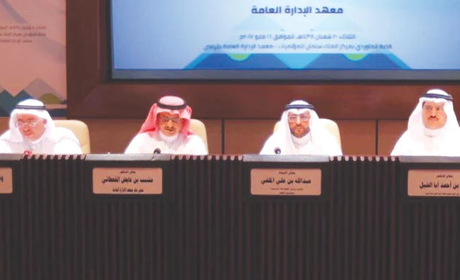Abdullah Al-Malfi, deputy minister of Civil Service, Bandar Abalkhail, vice chairman of Nazaha and Mushabab Al-Qahtani, IPA director general discuss code of conduct and ethics for public service, at the King Salman Center in Riyadh.