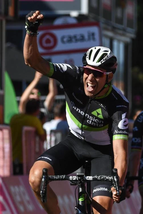 Omar Fraile of Spain celebrates as he crosses the finish line to win the 11th stage of Giro d'Italia, Tour of Italy cycling race, from Florence to Bagno di Romagna on Wednesday. (AP)
