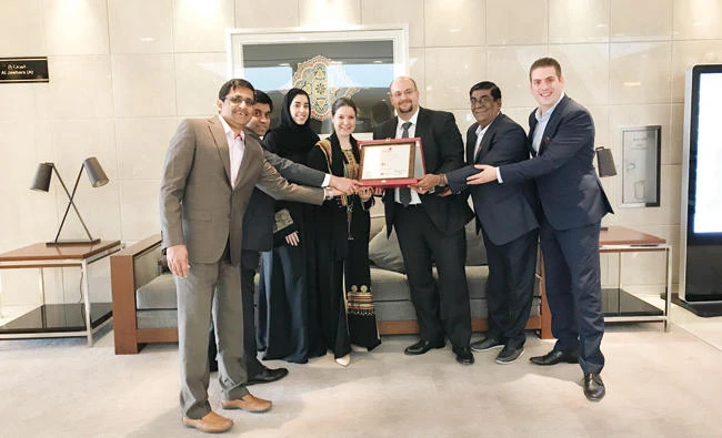Ziad Ghosn, MD of Great Place to Work in Saudi Arabia, presenting the recognition plaque to Anna Maria Dreesen El Achcar, head of PR operations India, Middle East and Africa at a ceremony held at InterContinental Riyadh recently. The photo also shows Michael Wierling, Mohamed Aleemuddin, Anjum Khan, Simon Manohar and Yasmin Al-Sanae.