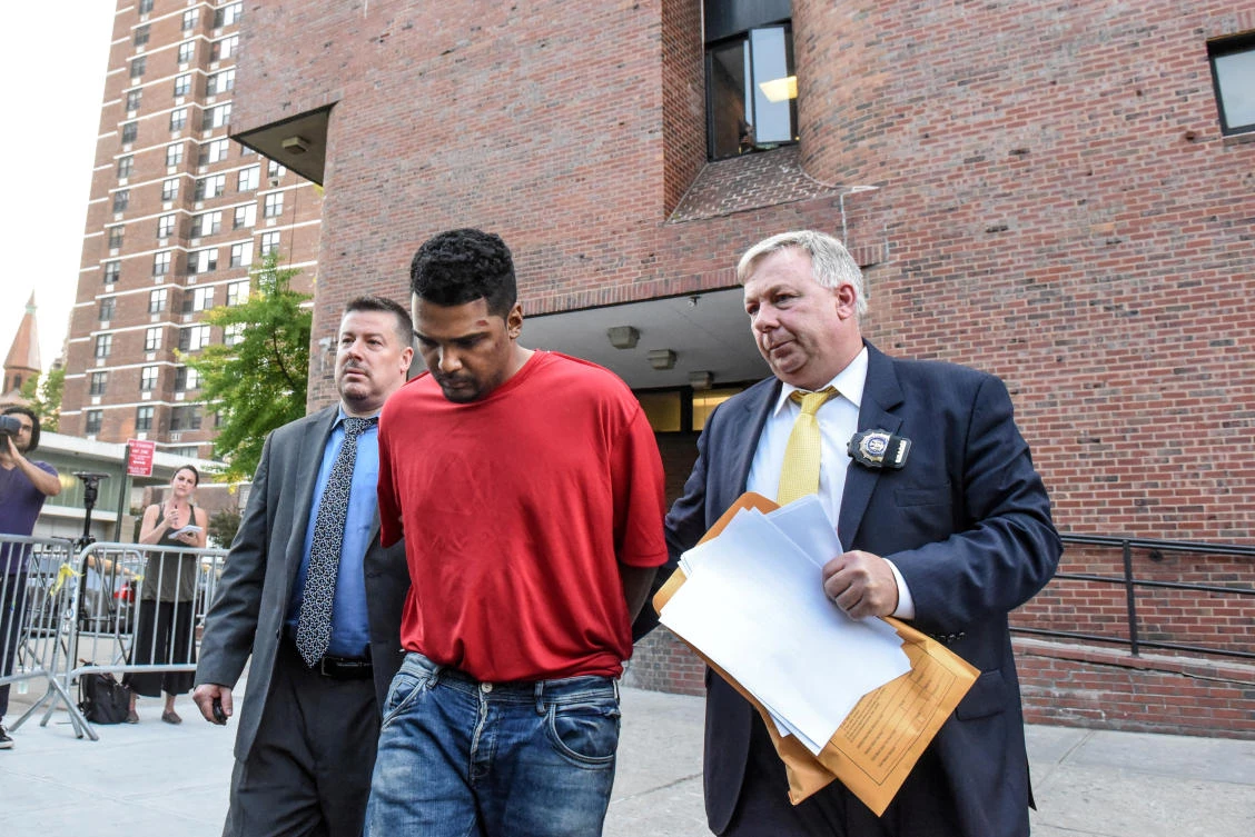 Richard Rojas is escorted from the 7th precinct by New York City Police officers after being processed in connection with the speeding vehicle that struck pedestrians on a sidewalk in Times Square in New York City, U.S., May 18, 2017. (Reuters)