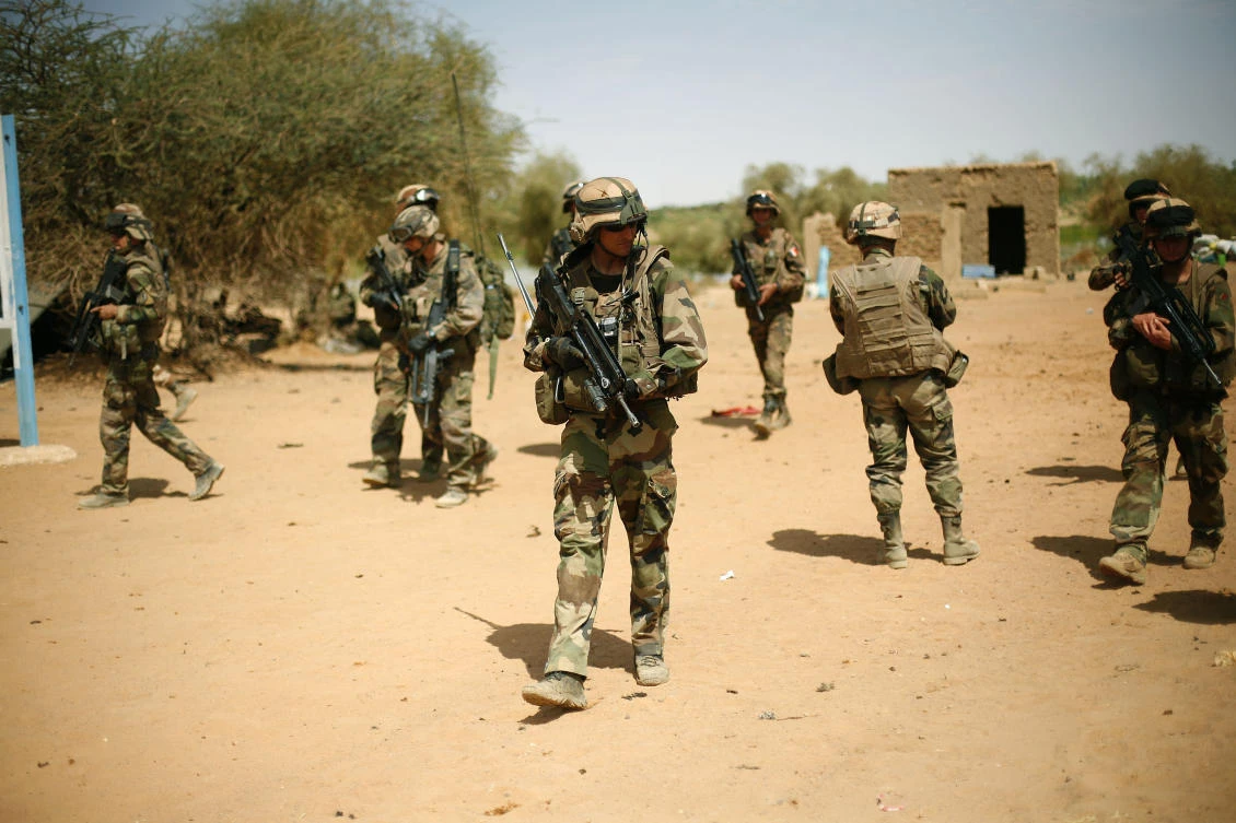 French soldiers secure the area where a suicide bomber exploded at the entrance of Gao, northern Mali. (AP)