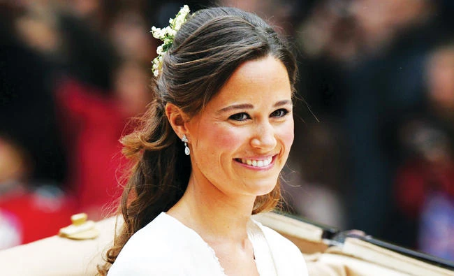 Philippa (Pippa) Middleton smiles during the wedding ceremony of Prince William and Kate Middleton in this file photo. (AFP)