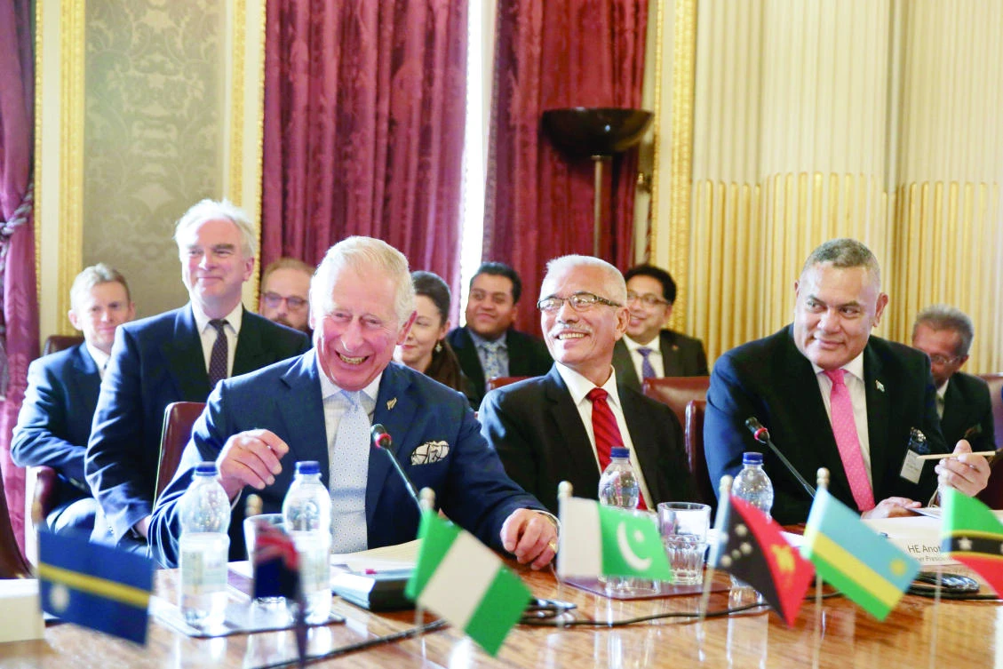 Britain’s Prince Charles, left first row, attends the Regenerative Development to Reverse Climate Change Conference (RDRCC) in the Commonwealth, in central London on Thursday. (AFP)
