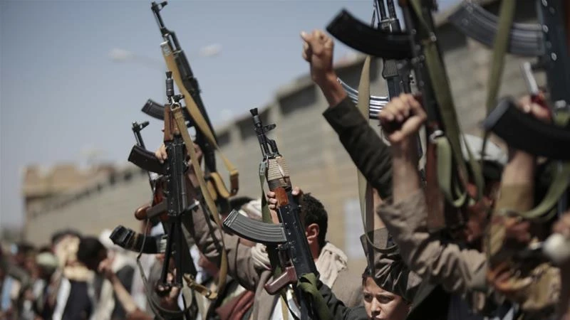 Tribesmen loyal to Houthi rebels hold their weapons as they chant slogans in this 2016 o(AP)