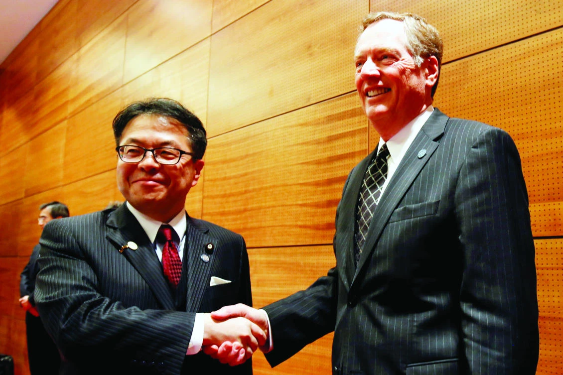 US Trade Representative Robert Lighthizer and Japan’s Trade Minister Hiroshige Seko, left, pose for a photo during the APEC Ministers Responsible For Trade (APEC MRT 23) meeting in Hanoi, Vietnam, on Saturday. (Reuters)