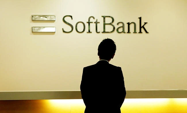 A man looks at the logo of SoftBank Group Corp at the company's headquarters in Tokyo, in this file photo taken on June 30, 2016. (REUTERS)