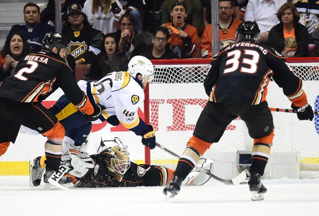 Pontus Aberg (46) of the Nashville Predators scores a goal as he falls to the ice against goaltender Jonathan Bernier (1) of the Anaheim Ducks in the third period of Game 5 of the Western Conference Final during the 2017 Stanley Cup Playoffs at Honda Center on Saturday in Anaheim, California. (AFP)