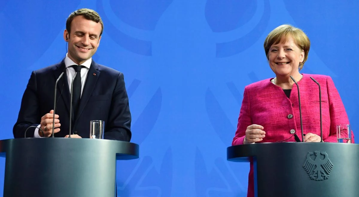 German Chancellor Angela Merkel and French President Emmanuel Macron. (AFP)